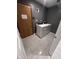 Functional laundry room equipped with modern washer and dryer, along with ample storage space at 11720 Grenadier Ln, Indianapolis, IN 46229