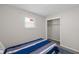 Bedroom featuring a closet with an open doorway and carpeted floor at 3125 N Tacoma Ave, Indianapolis, IN 46218