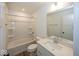 Bathroom with tub and shower combination, white fixtures, and modern vanity at 6596 Dogwood Dr, McCordsville, IN 46055