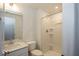 Bathroom featuring a vanity with solid surface counter and a walk-in shower at 6596 Dogwood Dr, McCordsville, IN 46055
