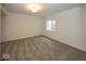 Cozy bedroom with carpet flooring and a window for natural light at 6596 Dogwood Dr, McCordsville, IN 46055
