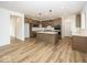 Spacious kitchen with a large island, modern appliances, and ample counter space at 6596 Dogwood Dr, McCordsville, IN 46055