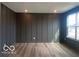 Stylish living room with dark accent wall and natural light at 6596 Dogwood Dr, McCordsville, IN 46055