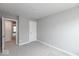 A bright bedroom with carpet, and multiple doorways for ease of access to other rooms at 7340 W County Road 600 Rd, McCordsville, IN 46055