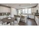 Bright eat-in kitchen features a center island with bar seating, stainless steel appliances and lots of counter space at 7340 W County Road 600 Rd, McCordsville, IN 46055