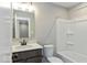 Bathroom with a single sink, toilet, and shower/tub combo at 7344 W County Road 600, McCordsville, IN 46055