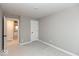 A bedroom with gray walls, white trim, and a carpeted floor at 7344 W County Road 600, McCordsville, IN 46055