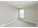 Bedroom with a window, gray walls, and carpeted floor at 7344 W County Road 600, McCordsville, IN 46055