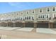 New townhomes feature garages, driveways, and front balconies at 7344 W County Road 600, McCordsville, IN 46055