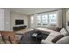 Inviting living room featuring modern furnishings, a cozy sectional sofa and bright natural light at 7344 W County Road 600, McCordsville, IN 46055