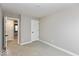 Neutral bedroom featuring soft carpet, white trim, and a closet at 7348 W County Road 600 Rd # 12-604, McCordsville, IN 46055