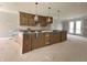 Kitchen installation in progress, featuring modern cabinets and pendant lighting at 7348 W County Road 600 Rd # 12-604, McCordsville, IN 46055