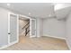 Open-concept living area featuring hardwood floors and access to the staircase at 7348 W County Road 600 Rd # 12-604, McCordsville, IN 46055