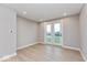 Bright, airy room with hardwood floors and sliding glass doors at 7348 W County Road 600 Rd # 12-604, McCordsville, IN 46055