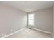 This cozy bedroom has plush carpet and a window offering lots of natural light at 7352 W County Road 600, McCordsville, IN 46055