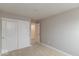 This carpeted bedroom features double closets and neutral paint, ready for personalization at 7352 W County Road 600, McCordsville, IN 46055