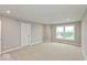 A spacious, bright bedroom with carpet, recessed lighting and natural light from a window at 7352 W County Road 600, McCordsville, IN 46055
