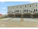 This attractive townhome offers an attached garage and personal balconies at 7352 W County Road 600, McCordsville, IN 46055