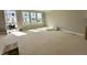 Living room featuring large windows and bright natural light in new construction home at 7352 W County Road 600 Rd, McCordsville, IN 46055