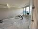 New room featuring natural light from a window and access to an exterior door at 7352 W County Road 600 Rd, McCordsville, IN 46055