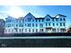 New construction townhomes show modern design and large windows for ample natural light at 7356 W County Road 600 Rd # 12-606, McCordsville, IN 46055