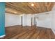 Bright bedroom with hardwood floors, natural light, and wooden ceiling at 800 Gondola Run, Greenfield, IN 46140