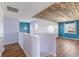 Open hallway showcasing elegant wooden ceiling and view to the bedrooms at 800 Gondola Run, Greenfield, IN 46140