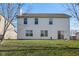 Two story house with white siding and a large backyard at 800 Gondola Run, Greenfield, IN 46140