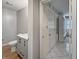 Updated half-bathroom features a new vanity with contemporary fixtures at 1242 Bitterwood Ct, Columbus, IN 47201