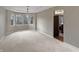 Dining room featuring neutral walls, carpet flooring, and large bay window at 1242 Bitterwood Ct, Columbus, IN 47201