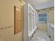 This mudroom provides practical storage with cubbies, hooks, and a nearby laundry area at 1242 Bitterwood Ct, Columbus, IN 47201