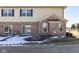 Back exterior featuring brick and a sliding glass door leading to the patio at 4007 Bullfinch Way, Westfield, IN 46062