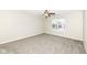 Bright bedroom features a ceiling fan, window, and carpet flooring at 4007 Bullfinch Way, Westfield, IN 46062