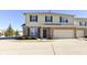 Two-story home with brick facade, attached garage, and well-maintained landscaping at 4007 Bullfinch Way, Westfield, IN 46062