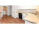 Kitchen features white cabinets, laminate countertops, and direct access to the laundry room at 4007 Bullfinch Way, Westfield, IN 46062