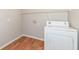 The laundry room is equipped with a washing machine and has wire shelving at 4007 Bullfinch Way, Westfield, IN 46062
