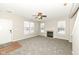 Bright living room with a cozy fireplace and neutral color palette at 4007 Bullfinch Way, Westfield, IN 46062