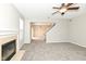 Bright living room with modern lighting and an open layout to the dining area at 4007 Bullfinch Way, Westfield, IN 46062