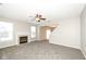 Spacious living room featuring a fireplace and stairs to the second floor at 4007 Bullfinch Way, Westfield, IN 46062