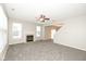 Open living room with fireplace, neutral walls, and carpet flooring at 4007 Bullfinch Way, Westfield, IN 46062