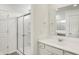 Clean bathroom features a glass-enclosed shower, white vanity, and ample lighting at 67 Sterling Pl, New Whiteland, IN 46184