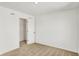 A clean bedroom with new carpet, closet and a view of the outside at 67 Sterling Pl, New Whiteland, IN 46184