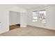 Open bedroom with a view of the neighborhood through the windows at 67 Sterling Pl, New Whiteland, IN 46184