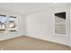 Bright bedroom offering new carpet, natural light and views of the neighbourhood at 67 Sterling Pl, New Whiteland, IN 46184