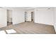 A carpeted bedroom has doors to the bathroom and hallways at 67 Sterling Pl, New Whiteland, IN 46184