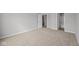 Bedroom with neutral walls, carpet, and bathroom view, offering a cozy and adaptable space at 10603 Banyan Wood Ct, Indianapolis, IN 46239