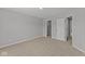 Bedroom featuring neutral walls, carpet, and closet, offering a comfortable and adaptable space at 10603 Banyan Wood Ct, Indianapolis, IN 46239