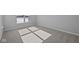 Cozy bedroom featuring neutral walls, plush carpeting and a bright window at 3509 Wrangler Dr, Bargersville, IN 46106