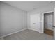Bedroom featuring neutral walls, plush carpeting and a closet with open door at 3509 Wrangler Dr, Bargersville, IN 46106