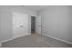 Bedroom featuring neutral walls, plush carpeting and a closet with open door at 3509 Wrangler Dr, Bargersville, IN 46106